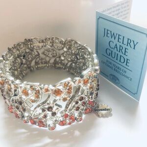 Elegant Silver and Orange Bracelet